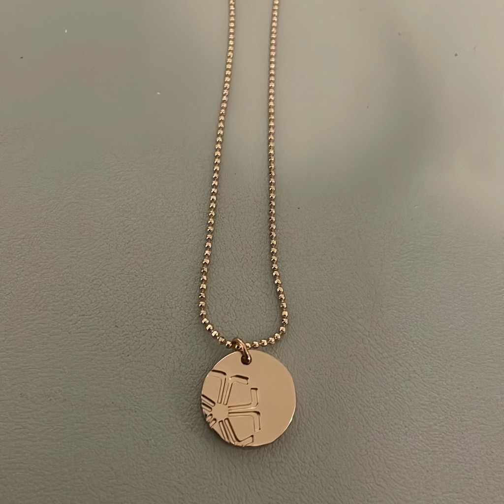 Trina Turk Necklace With Circle Pendant With Flower Details